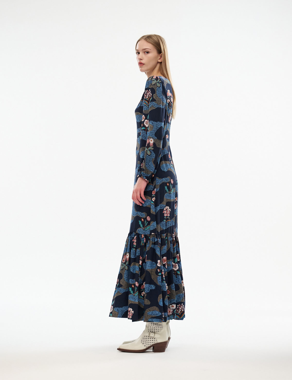 Navy long-sleeve midi dress with crew neck and tiered skirt, multicolor novelty print