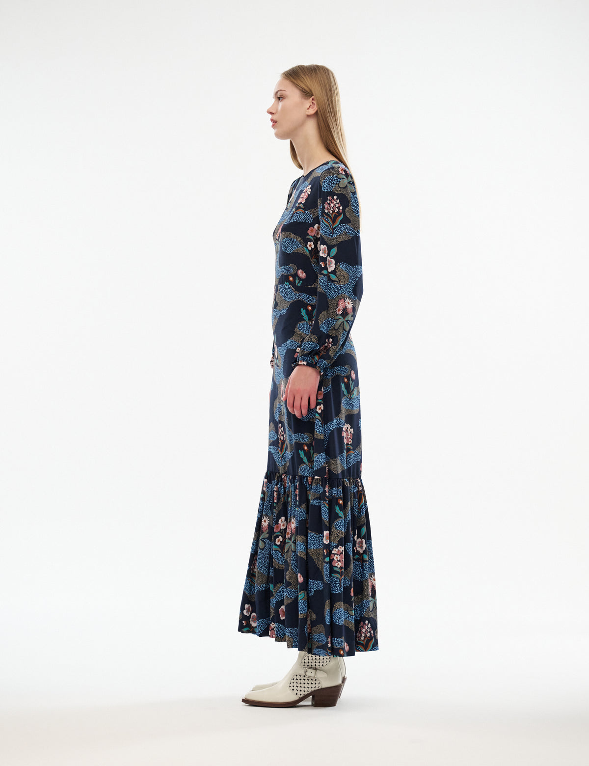 Navy long-sleeve midi dress with crew neck and tiered skirt, multicolor character print