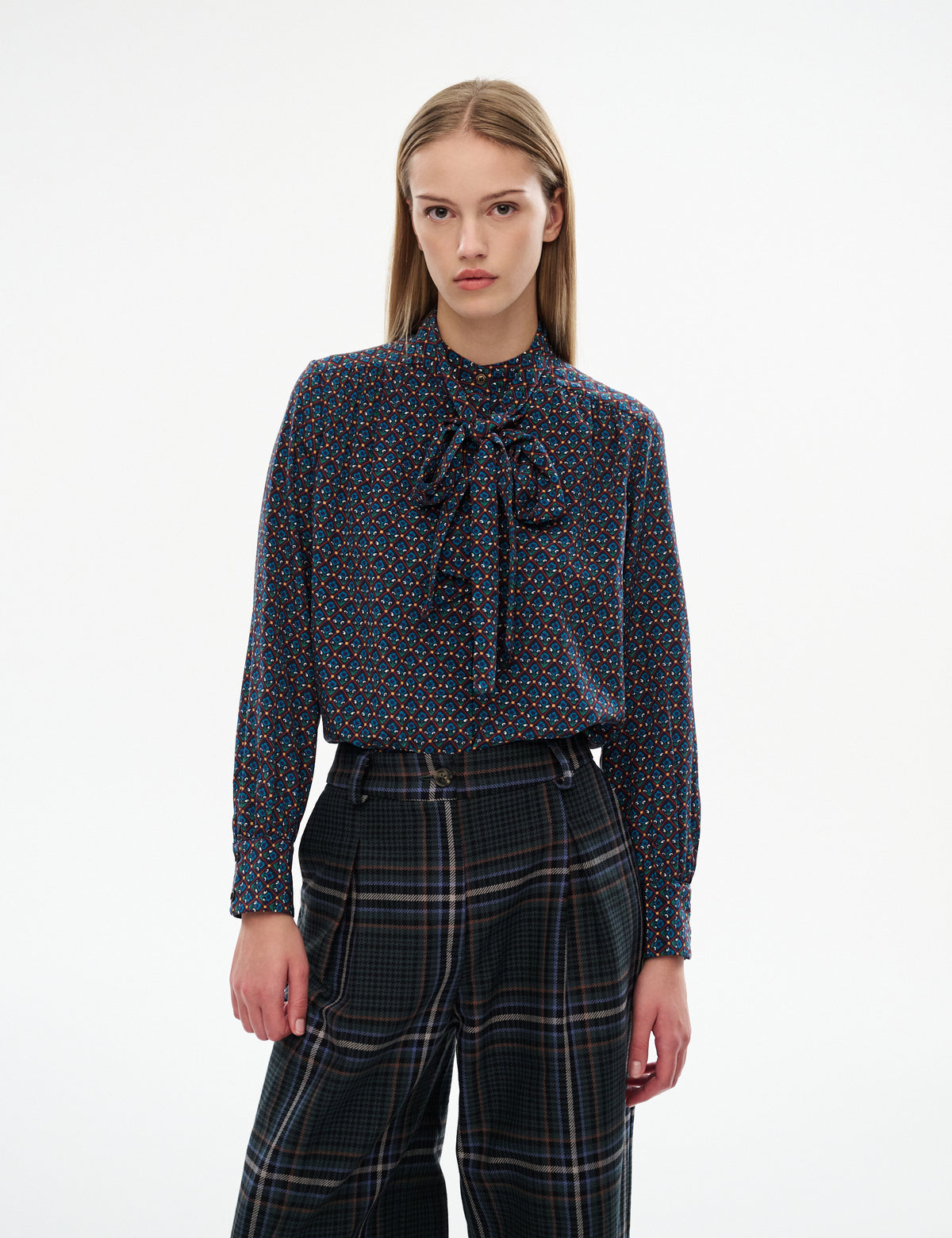 High-waisted plaid wide-leg trousers, dark navy/green, with belt loops and tailored waistband.
