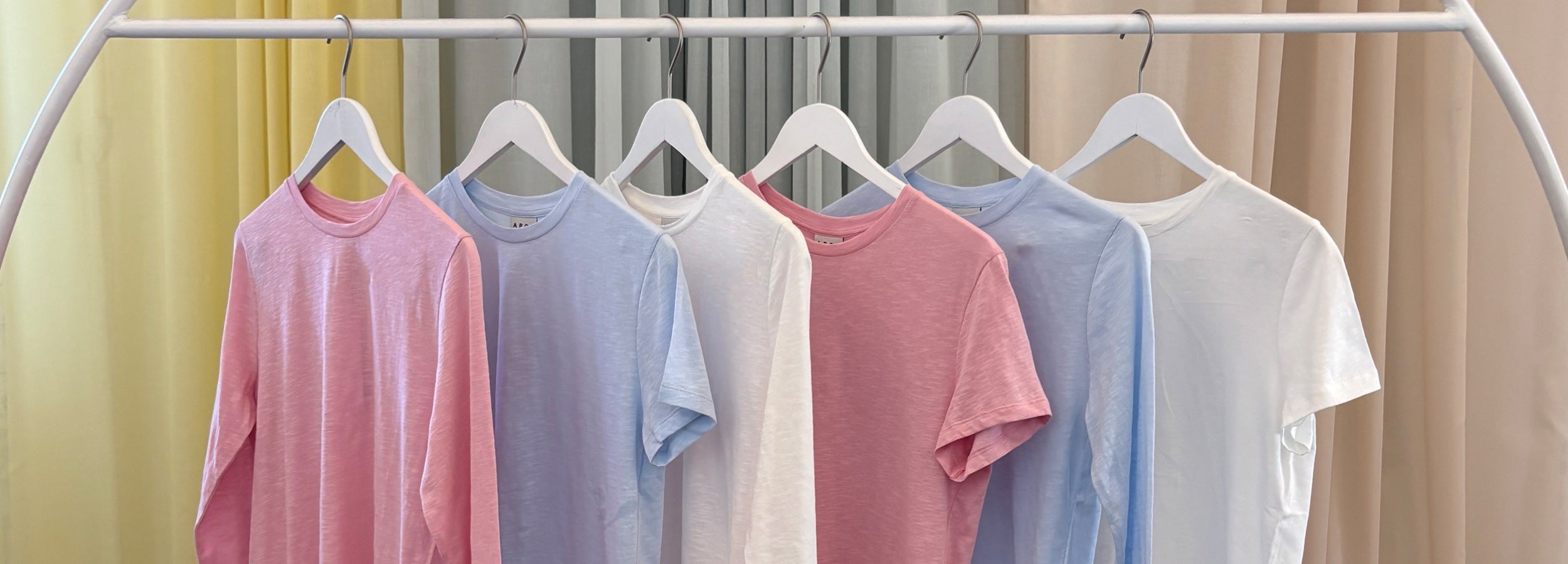 APOF solid color women's t-shirts in white, pink and light blue